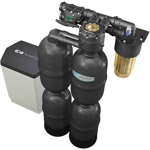 Water filtration and softening system with tanks, filters, and a salt tank.