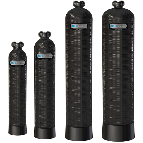 Four black water filter tanks of varying sizes.