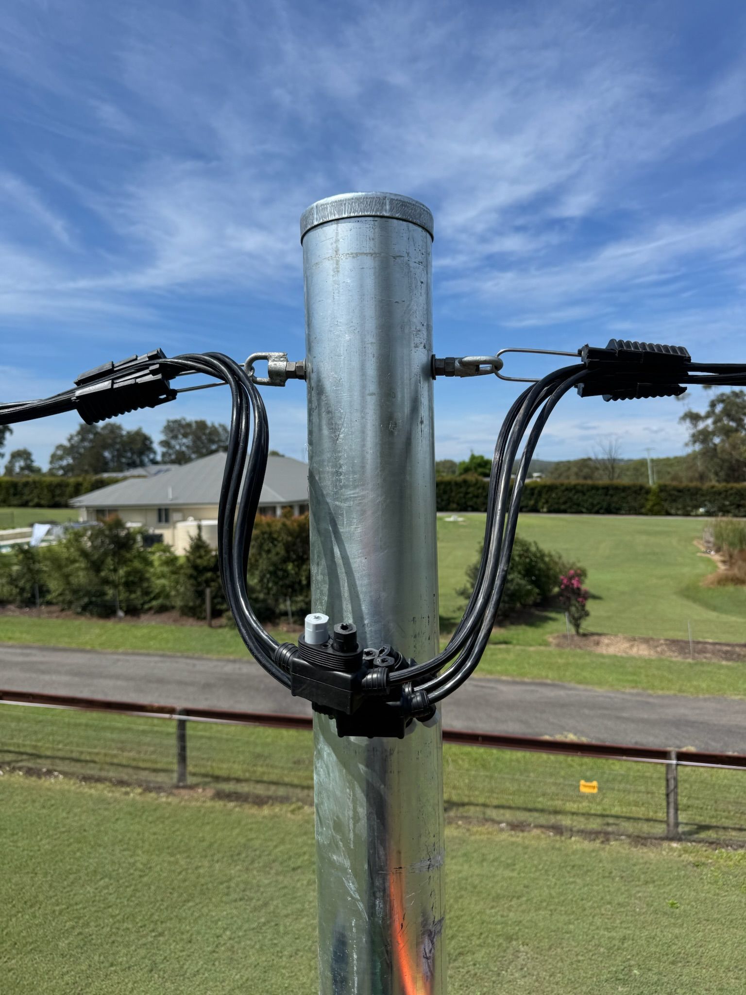 Black Cableattached to A Pole — DMP Electrical Contractors In Cessnock, NSW