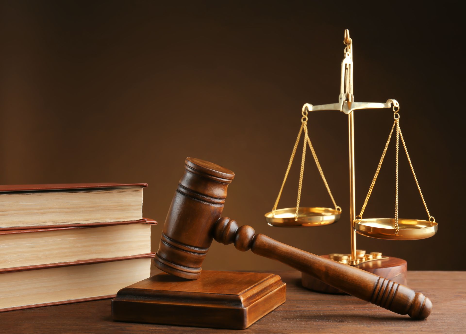 Gavel, scales of justice, and law books showcasing personal injury lawyer in action.