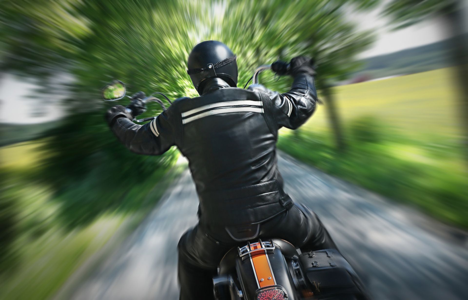 Motorcycle Attorney— Green Bay, WI — Janssen Law Man Signing A Document — Green Bay, WI — Janssen Law