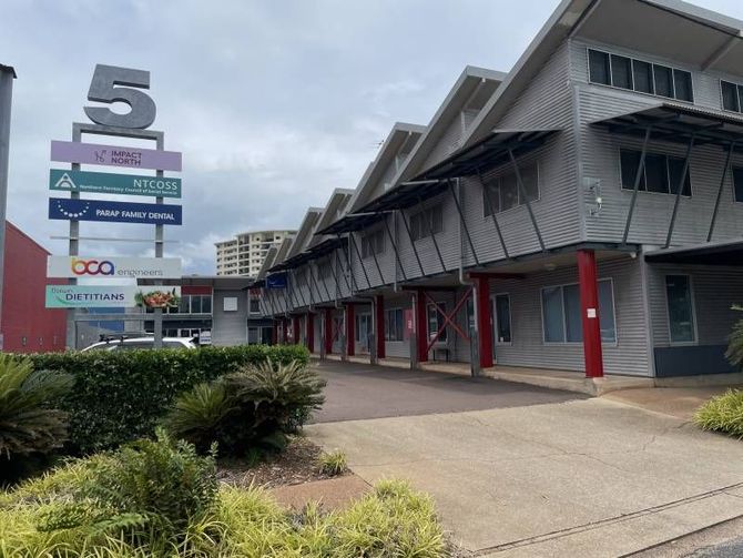 A large building with a sign that says 5 on it — Parap Family Dental in Parap, NT