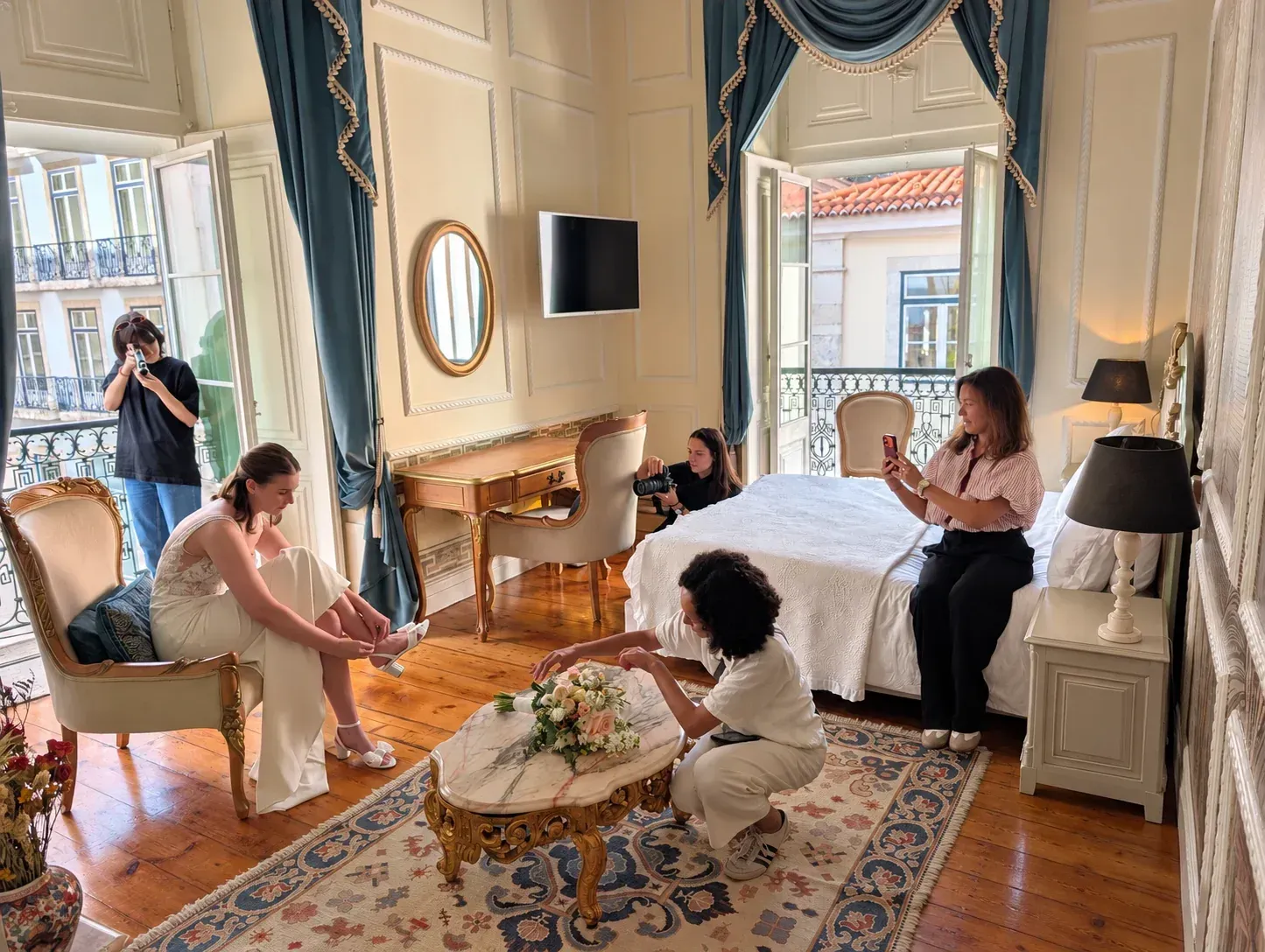 Bride and team during elopement preparations in Portugal.