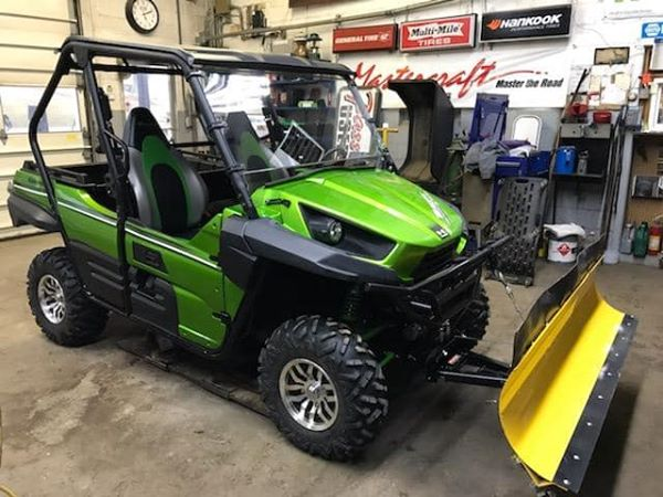 Green Vehicle With Dozer — Passerini's Auto Service — Kittanning, PA