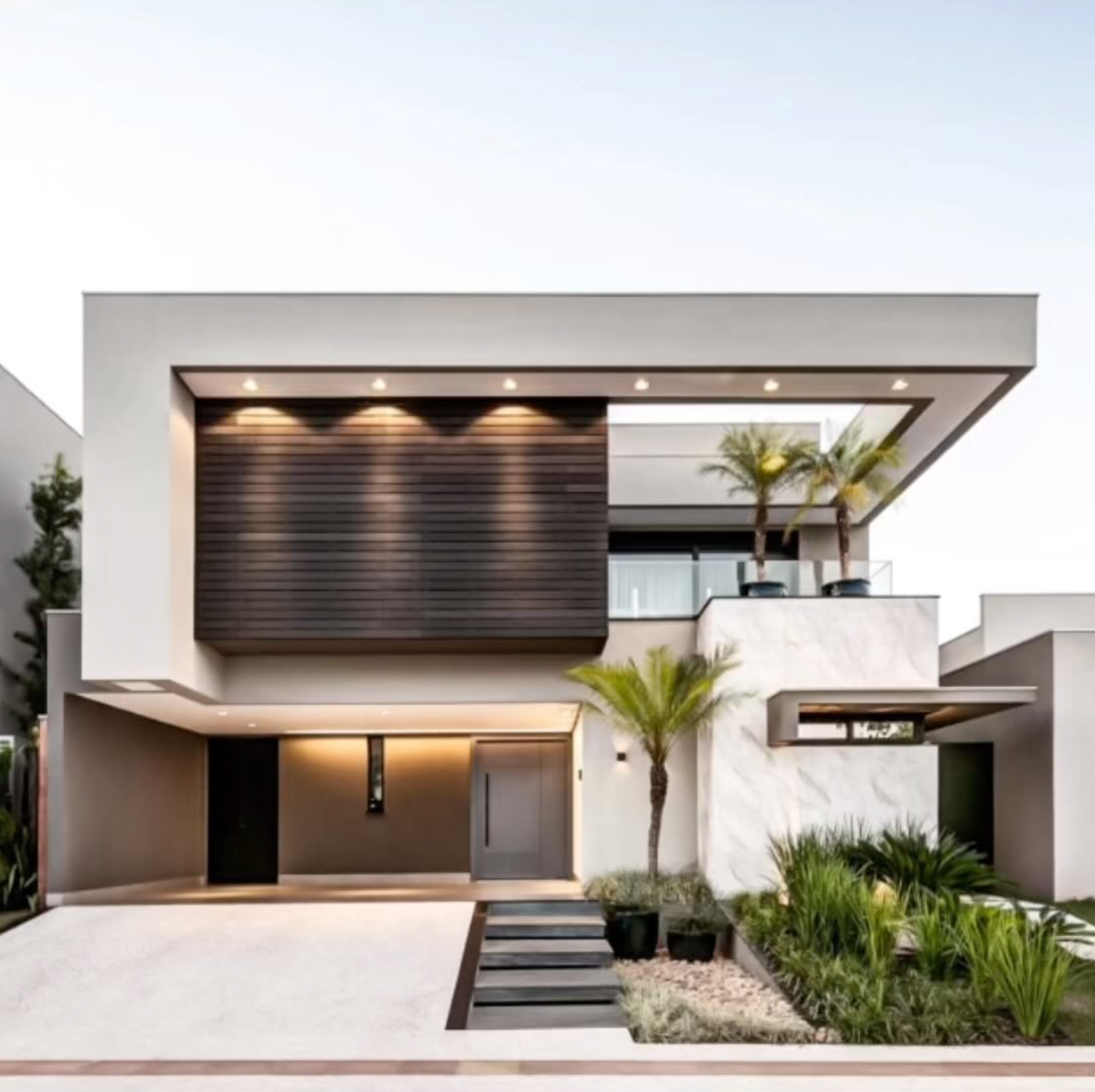 A modern house with a staircase leading up to it