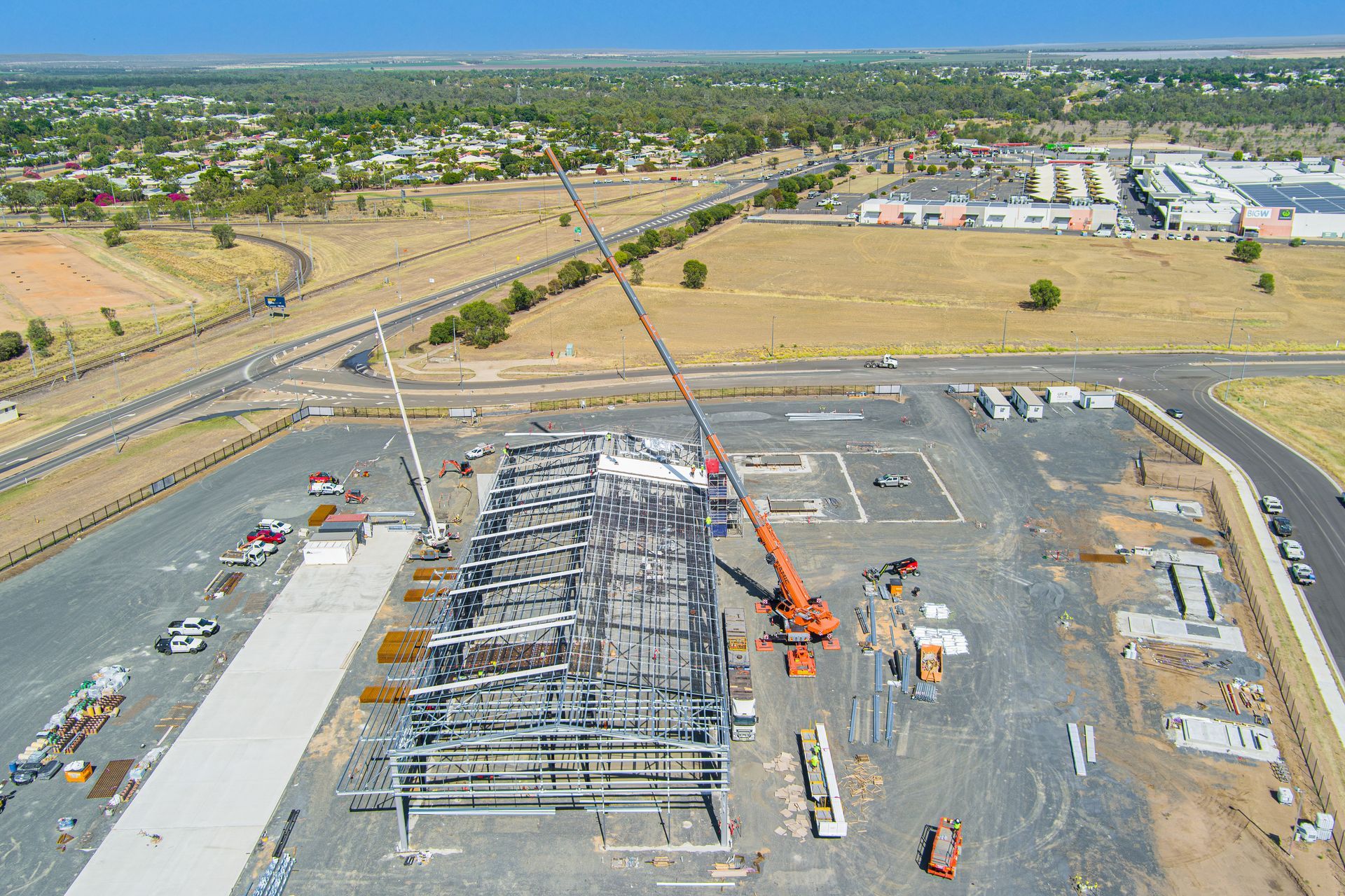 An Aerial View Of A Construction Site With A Crane — Dynamic Crane Hire In Emerald, QLD