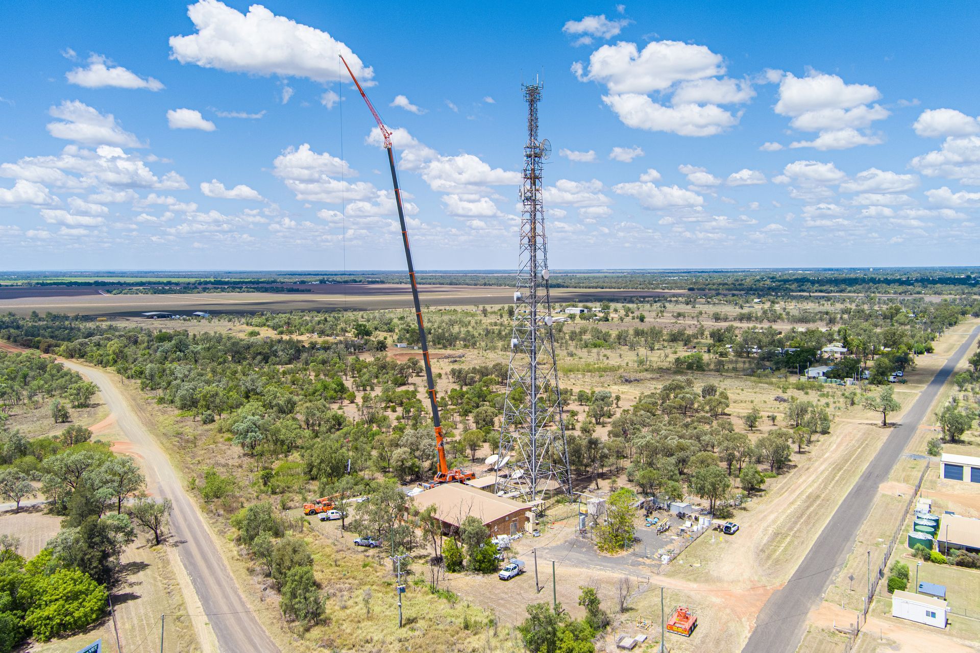An Aerial View Of A Tower Being Built In The Middle Of A Field — Dynamic Crane Hire In Emerald, QLD