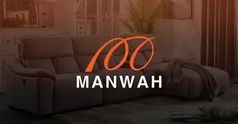 A gray, L-shaped fabric sectional sofa displayed in a home interior, overlaid with the orange Manwah company logo.