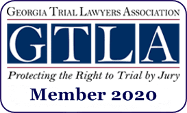 GTLA membership badge: Blue, white, and red logo stating 