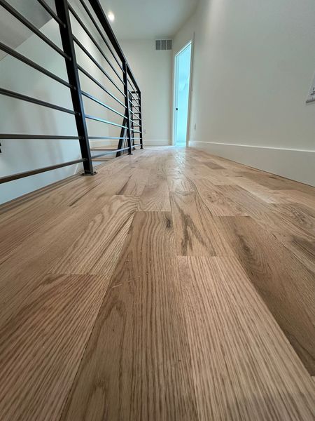 Ceric Hardwood Floors — refinished hardwood floor, gleaming finish