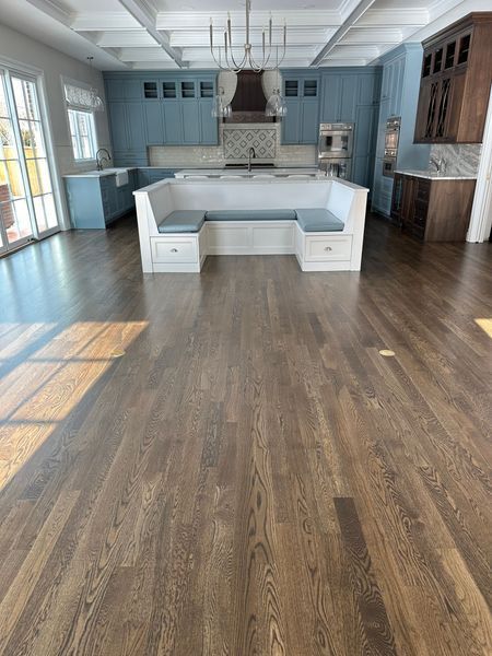 Ceric Hardwood Floors — wide-angle view of completed hardwood floor installation