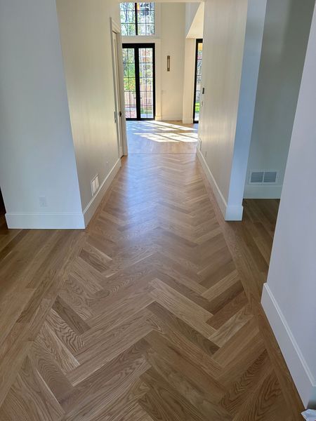 Ceric Hardwood Floors — hardwood floor installation, natural light highlighting grain