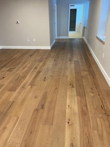 Ceric Hardwood Floors — hardwood floor installation, open living area