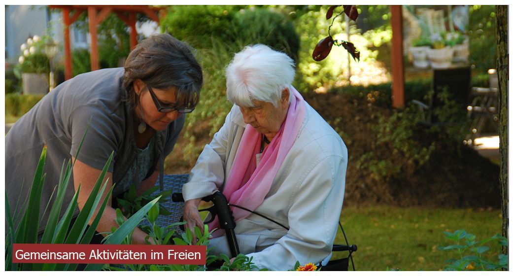 A caregiver and an older person in a garden, with text overlay