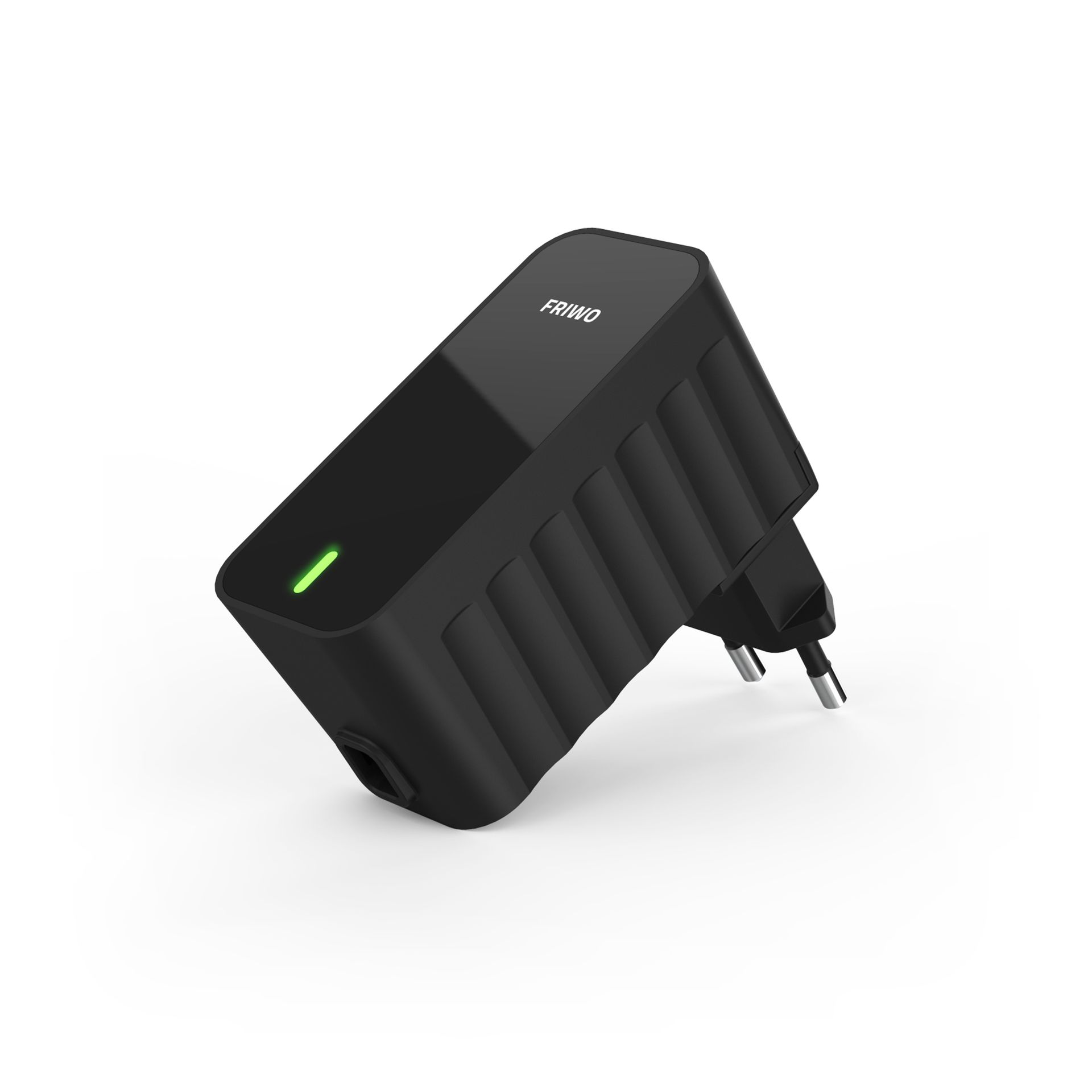 A black power supply is sitting on a white surface