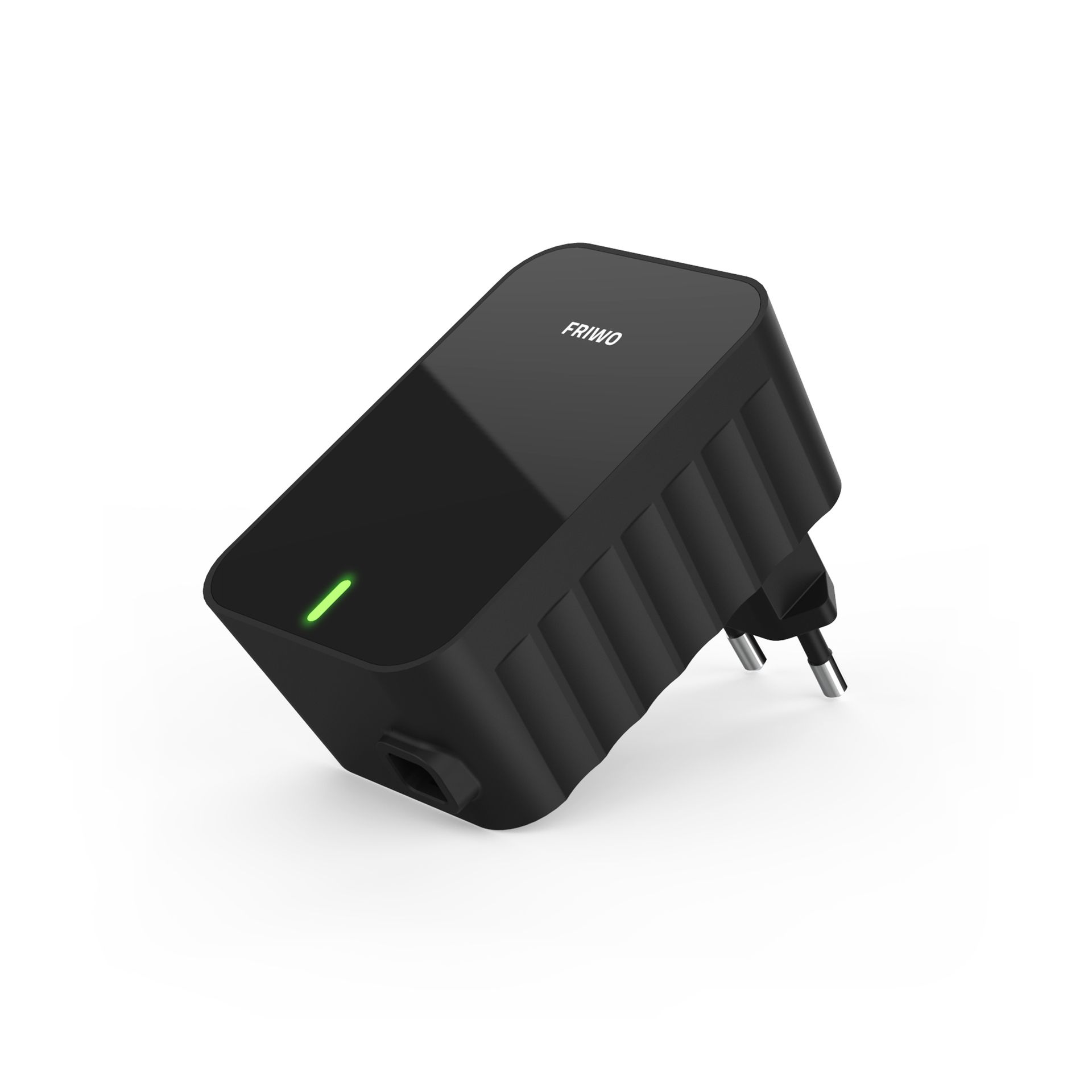 A black power supply is sitting on a white surface