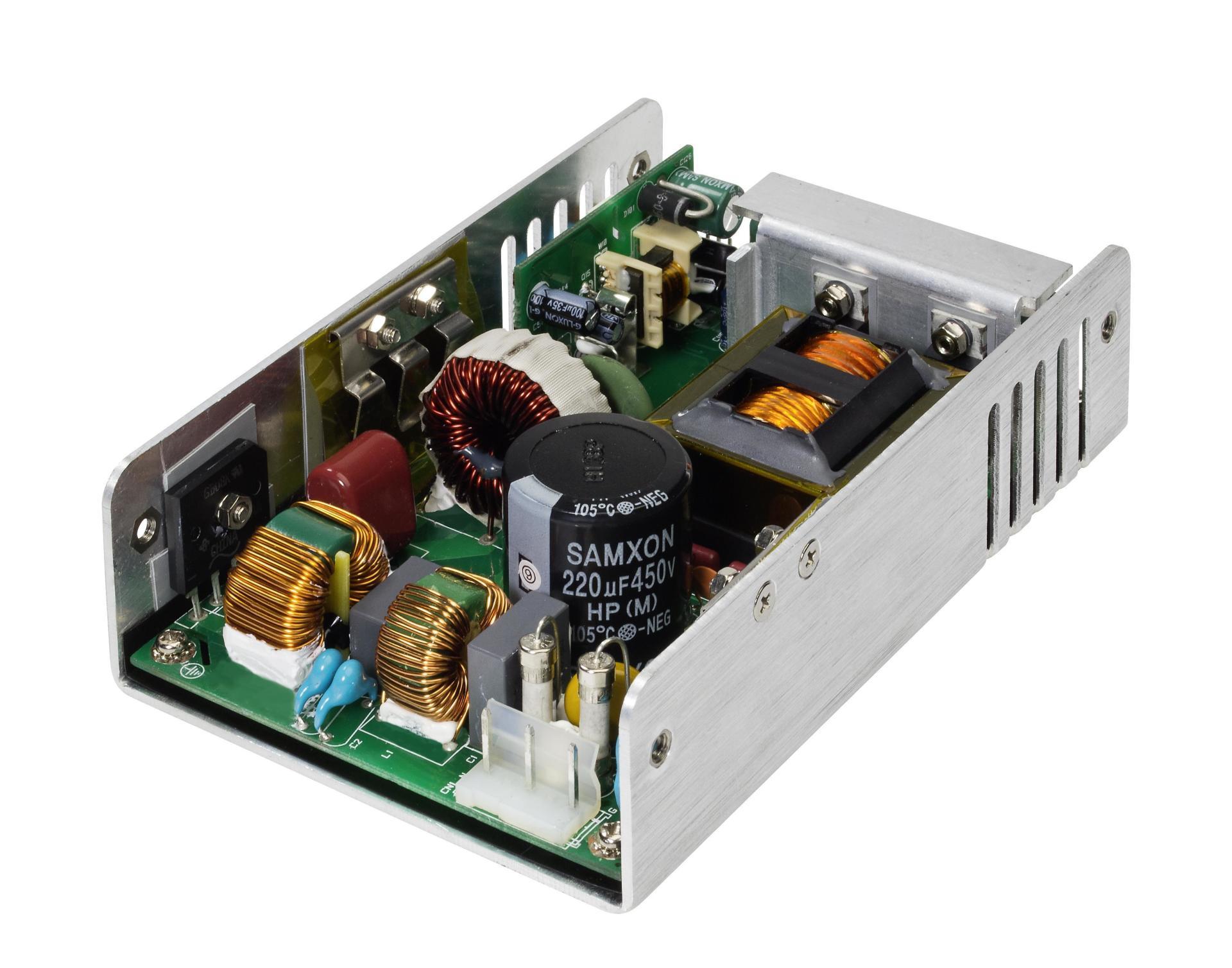 A black power supply is sitting on a white surface
