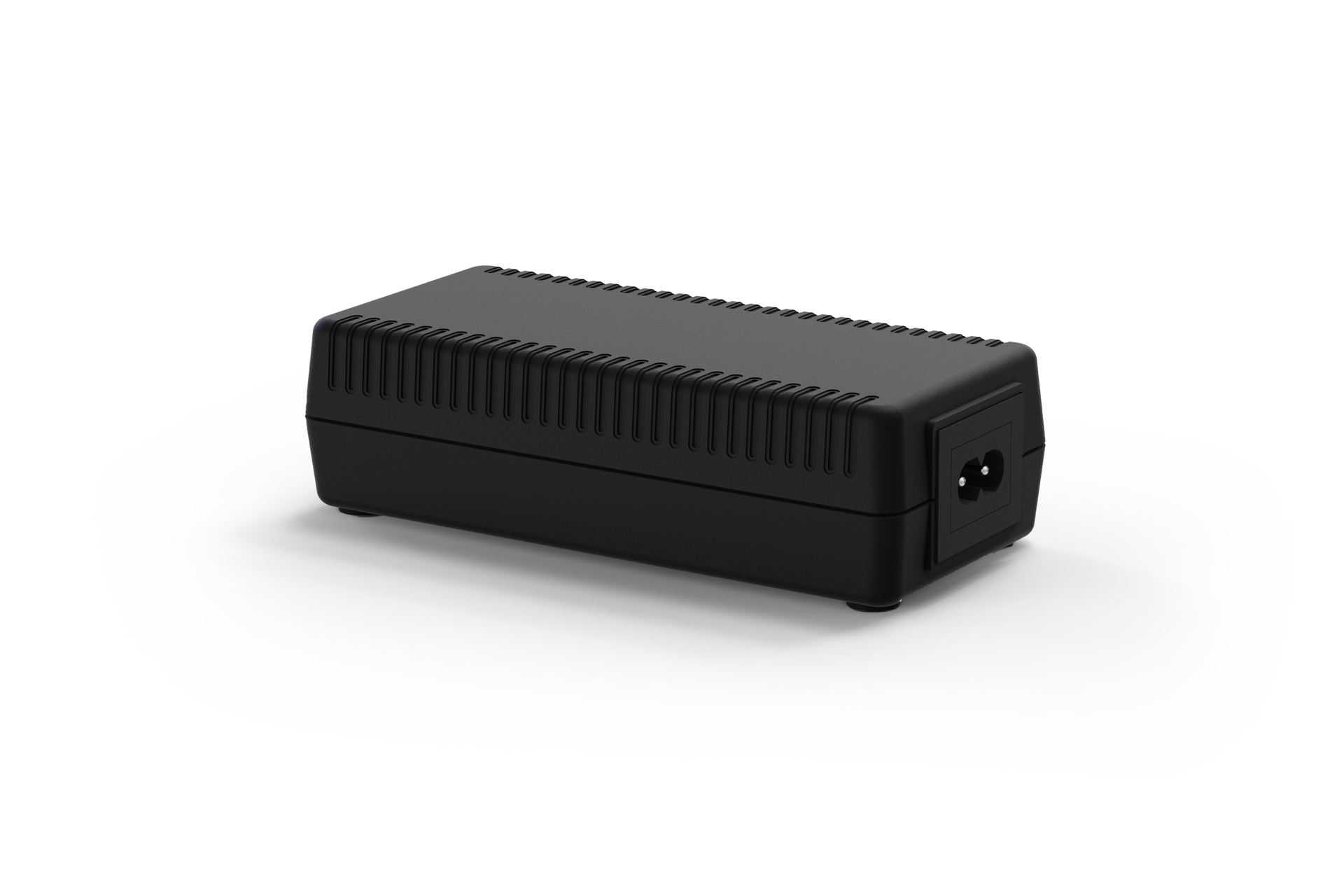 A black desktop power supply is sitting on a white surface.