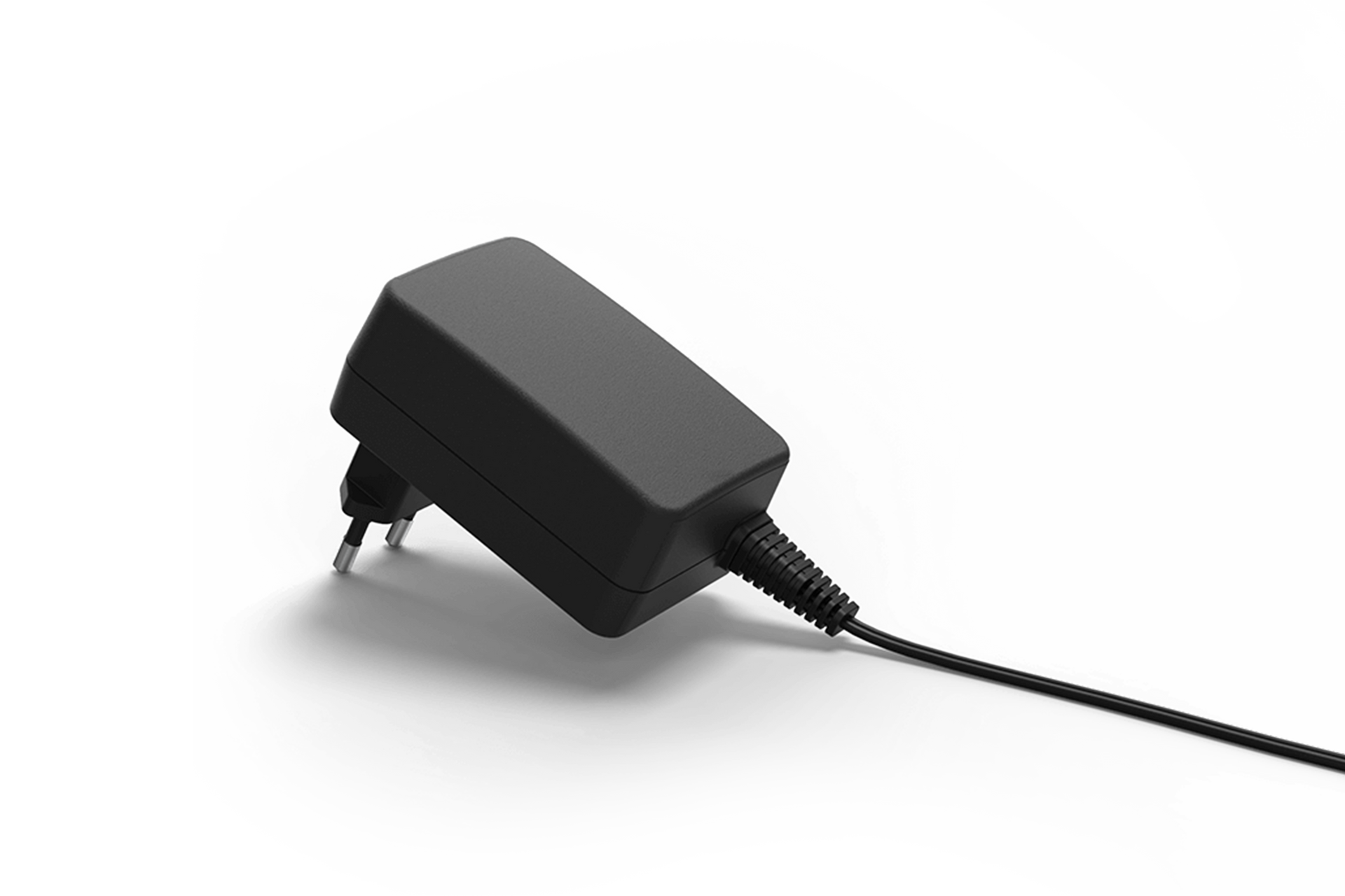 A black power supply with a cord attached to it