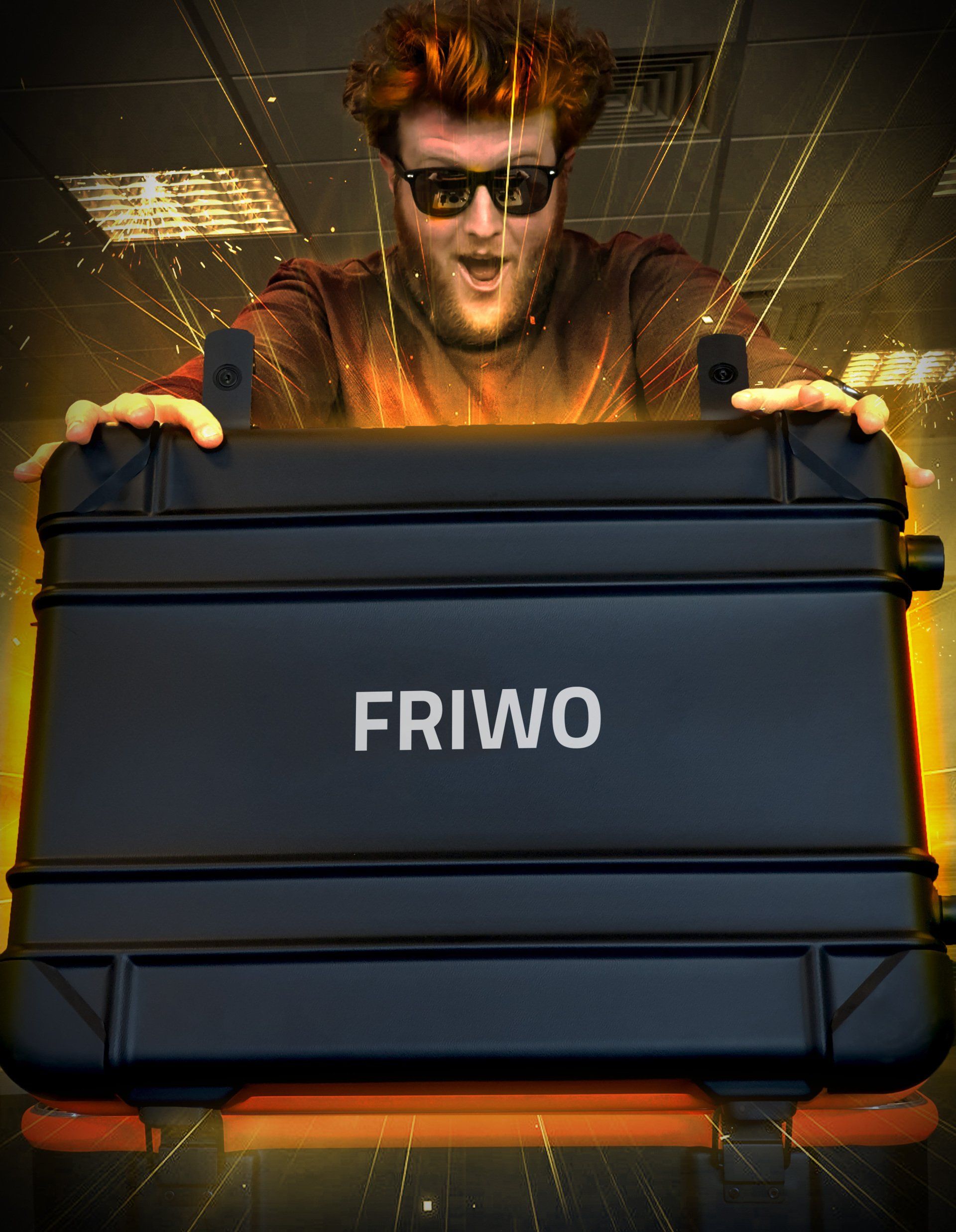 A man is holding a black case that says friwo
