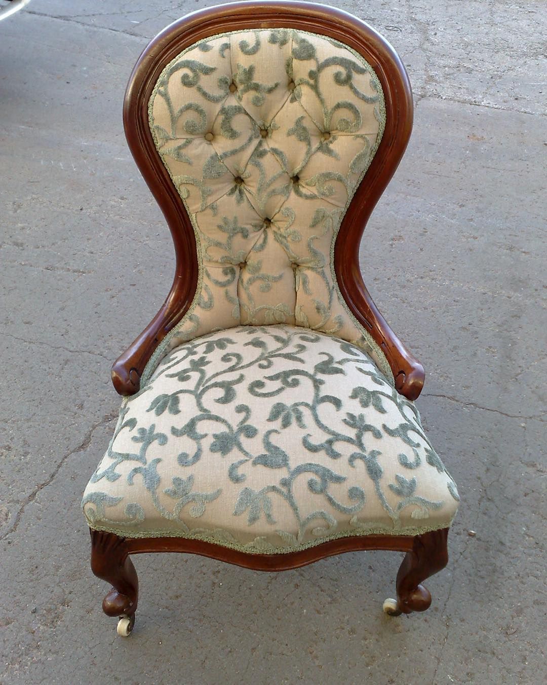 A Chair With a Floral Pattern on the Seat and Back — Aztak Upholstery In Manunda, QLD