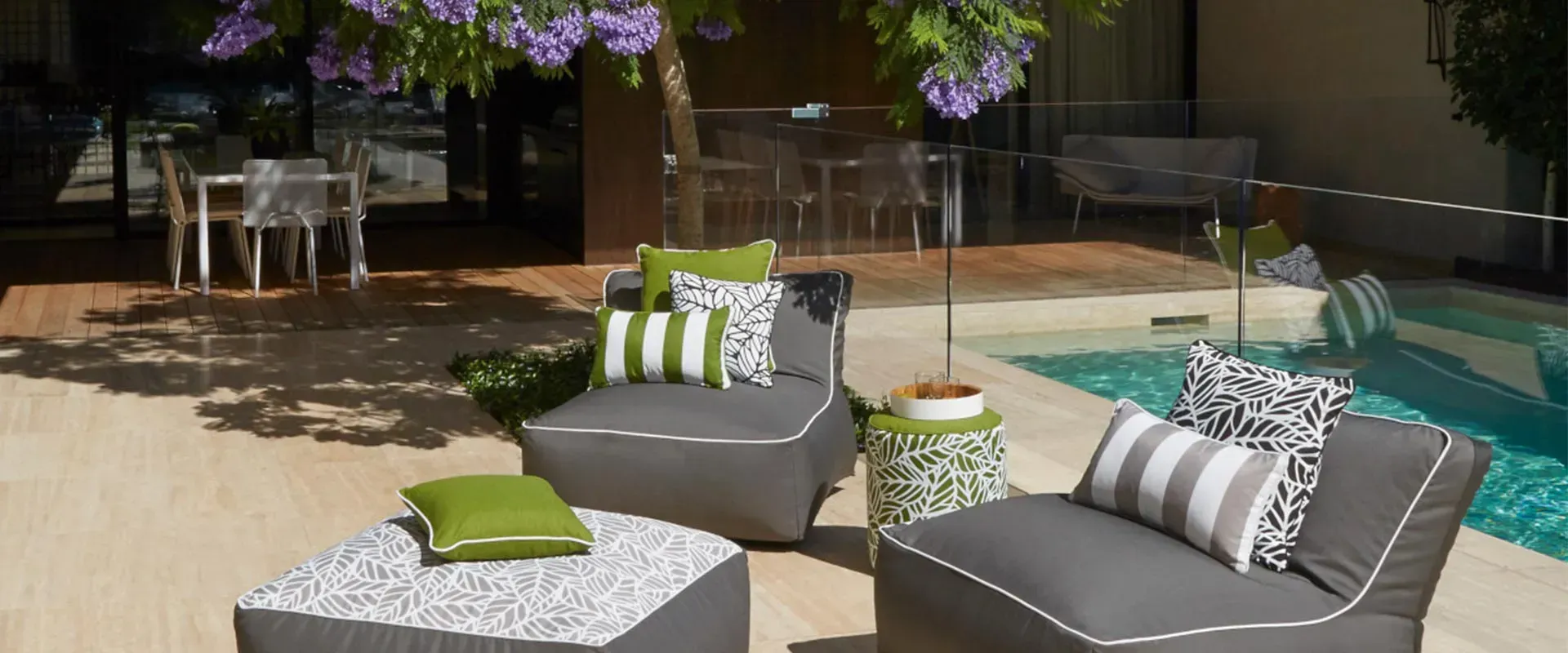 A Living Room With A Blue Couch And A Striped Rug — Aztak Upholstery In Manunda, QLD