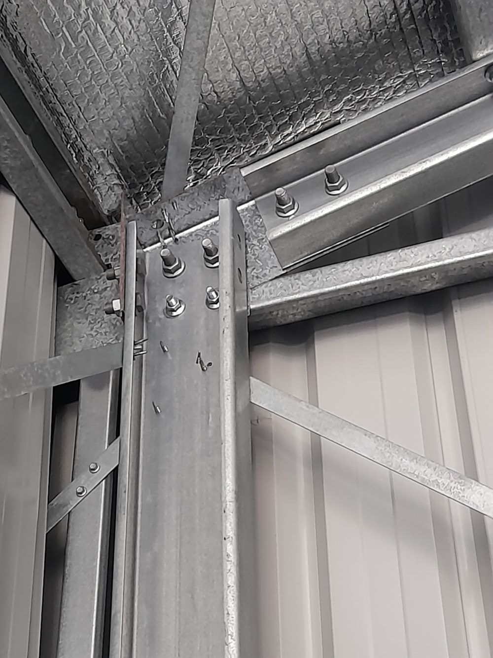 A Close Up Of A Metal Structure In A Building — Whit Coast Sheds in  Gregory River, QLD