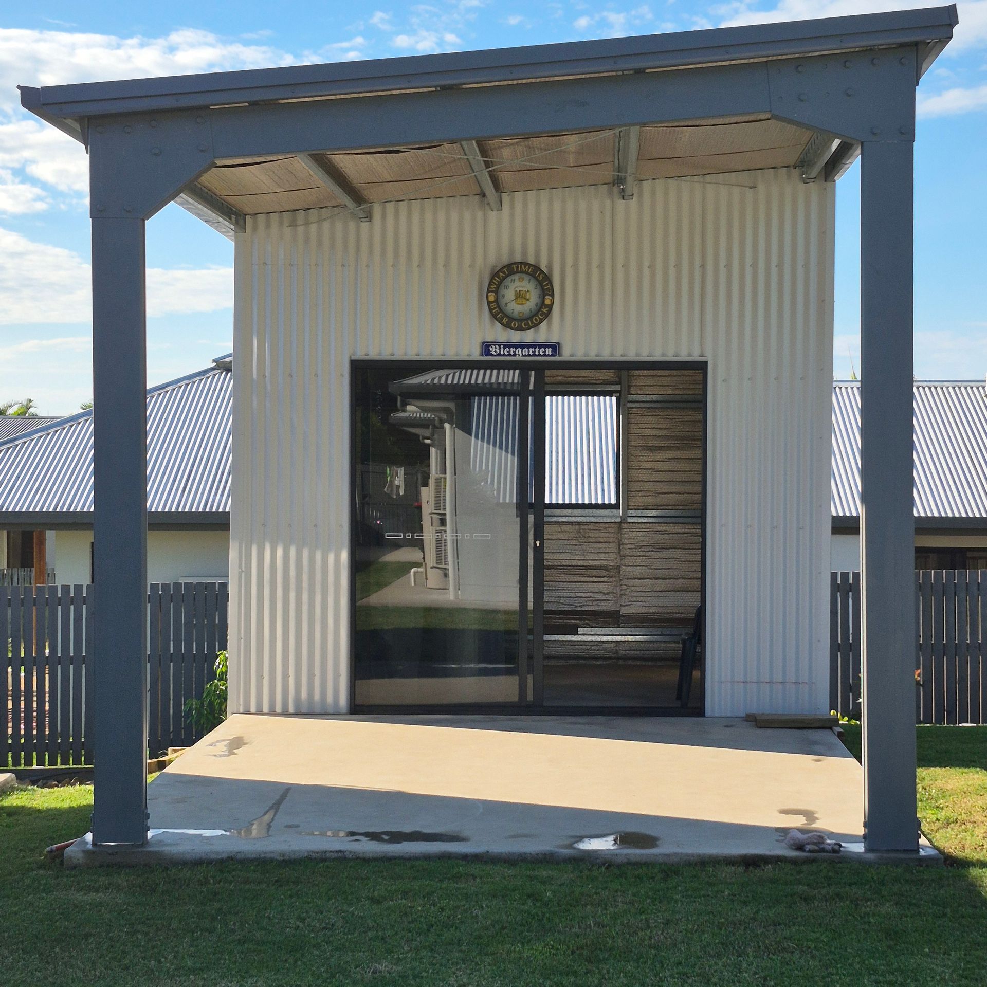 A Small Outdoor Shed with Corrugated White Walls — Whit Coast Sheds in Gregory River, QLD