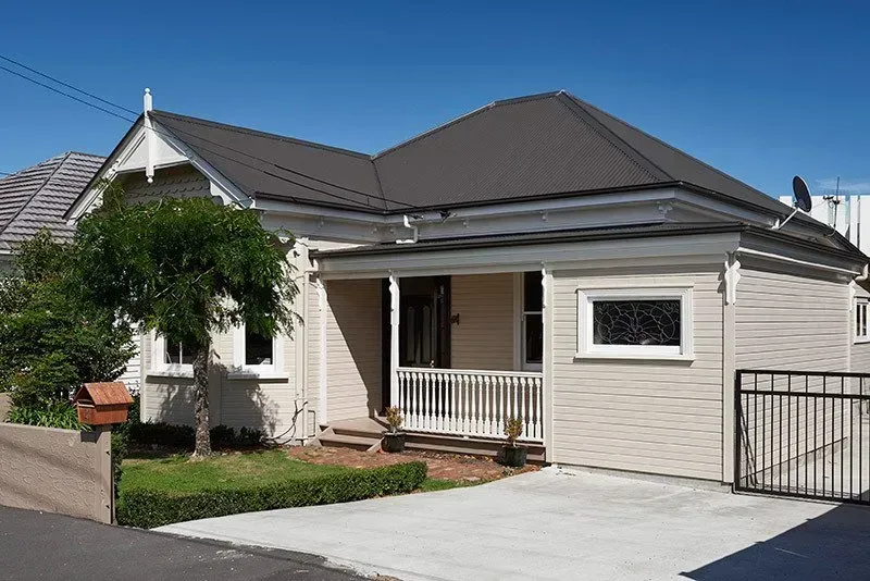 House with Black Roofing — Auckland, NZ — Pro Roofing