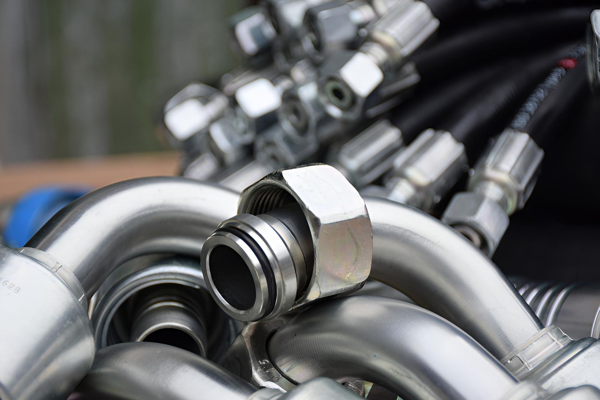 A Bunch Of Hydraulic Hoses — Action Hose & Fitting Solutions In Loganholme, QLD