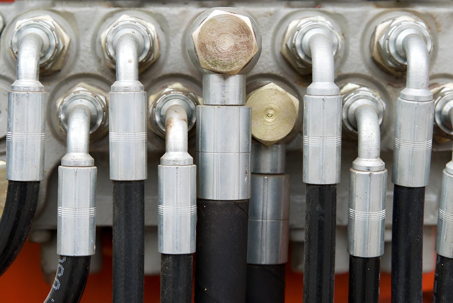 A Bunch Of Hydraulic Hoses Are Connected — Action Hose & Fitting Solutions In Loganholme, QLD