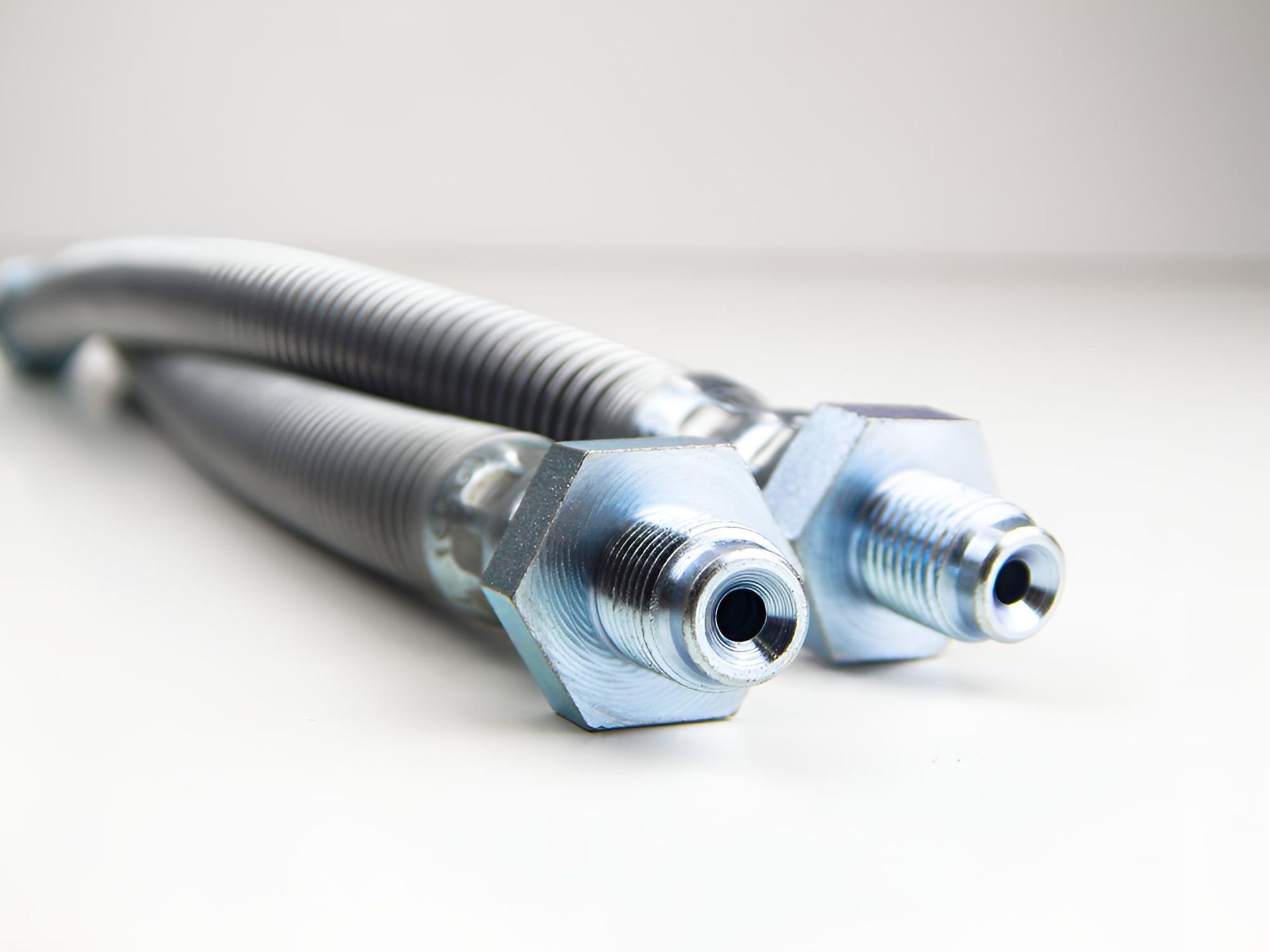 A Green Hose Is Being Used — Action Hose & Fitting Solutions In Brisbane, QLD