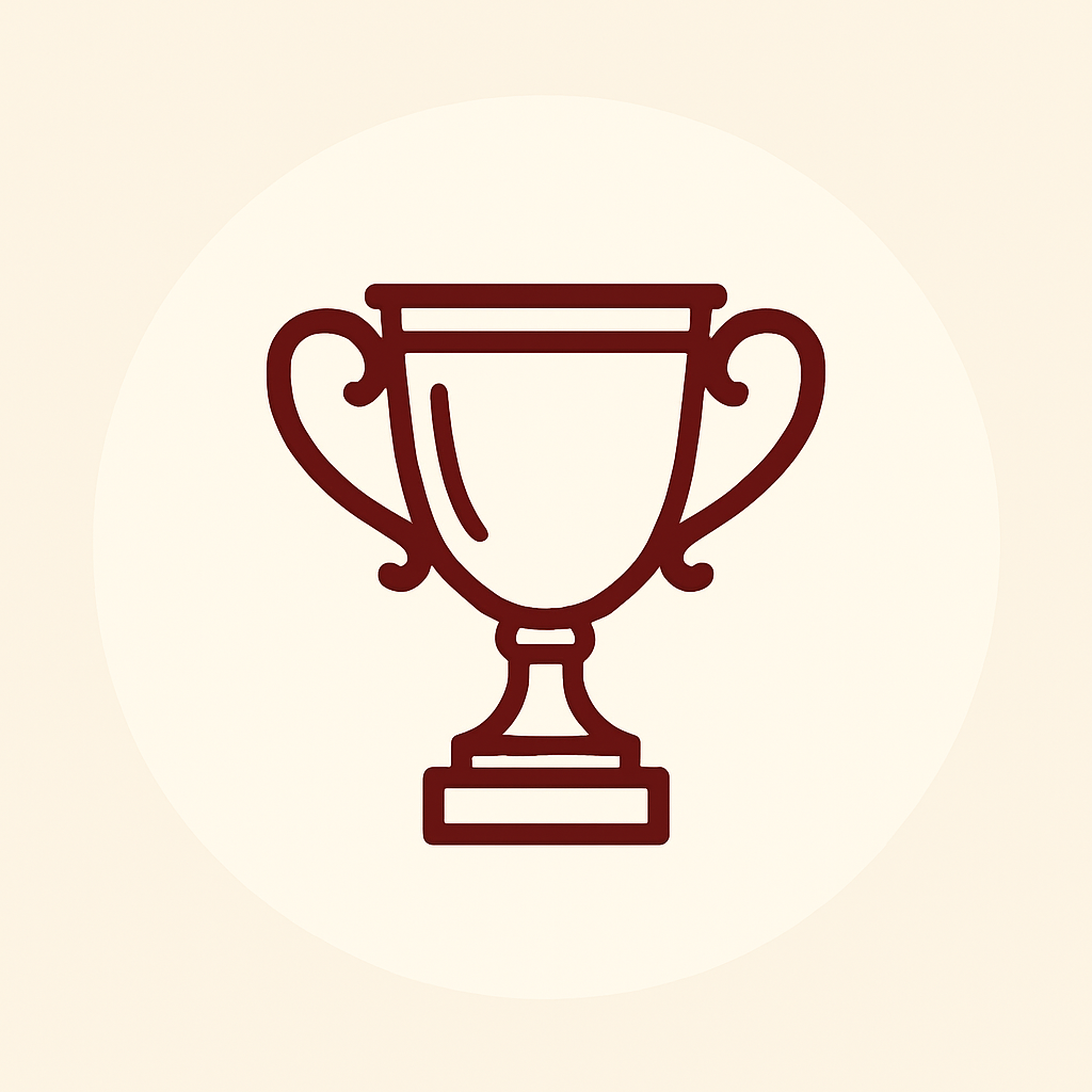 Outline icon of a trophy cup symbolising engraving services.