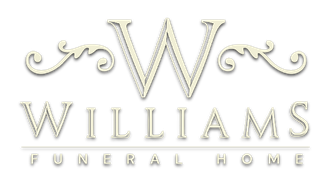 Williams Funeral Home logo with a decorative gold &ldquo;W&rdquo; and elegant scrollwork on a light background