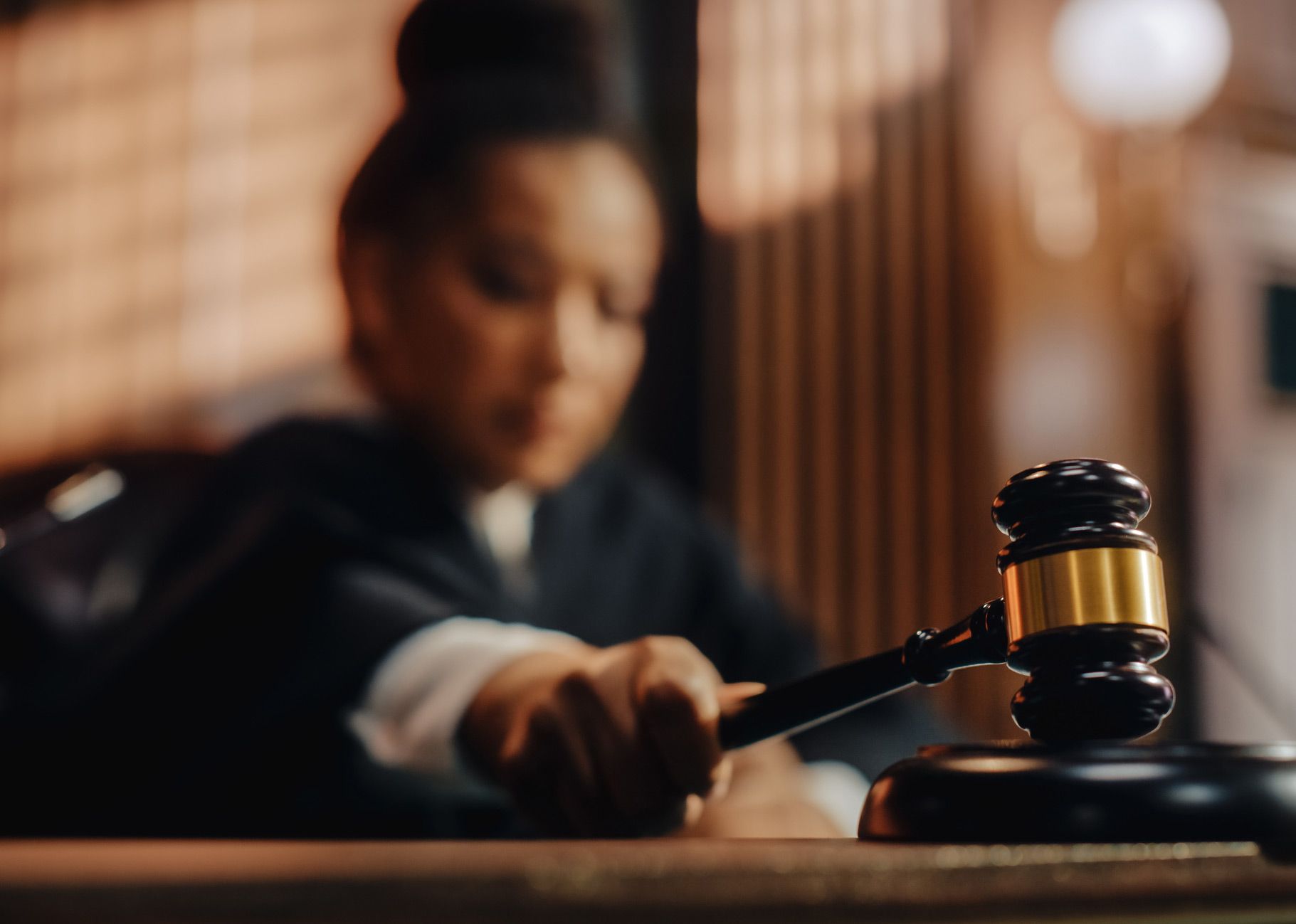Judge Holding A Wooden Gavel
