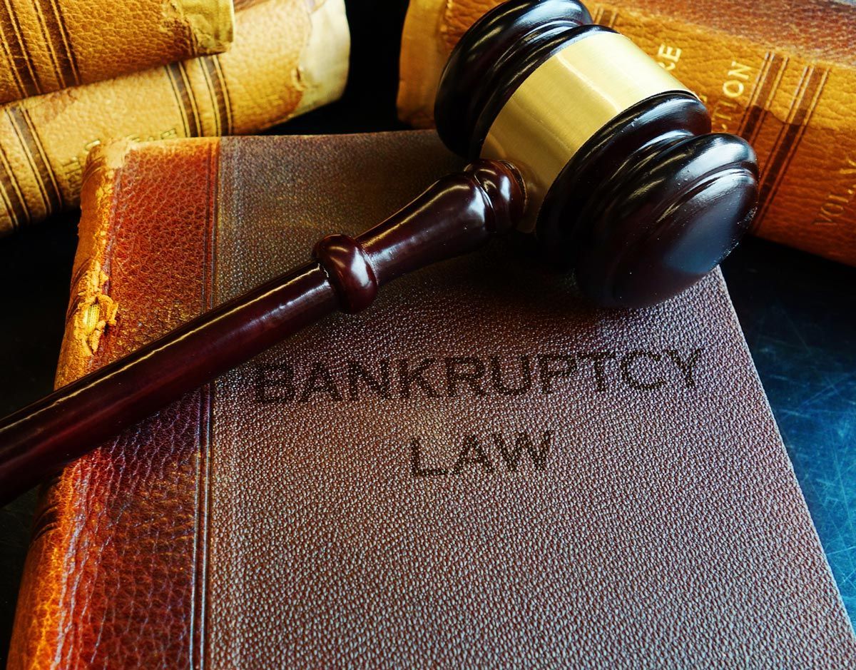 Judge’s gavel resting on a bankruptcy law book — Fairlawn, OH — Susan Lax Law Office Judge’s gavel resting on a bankruptcy law book