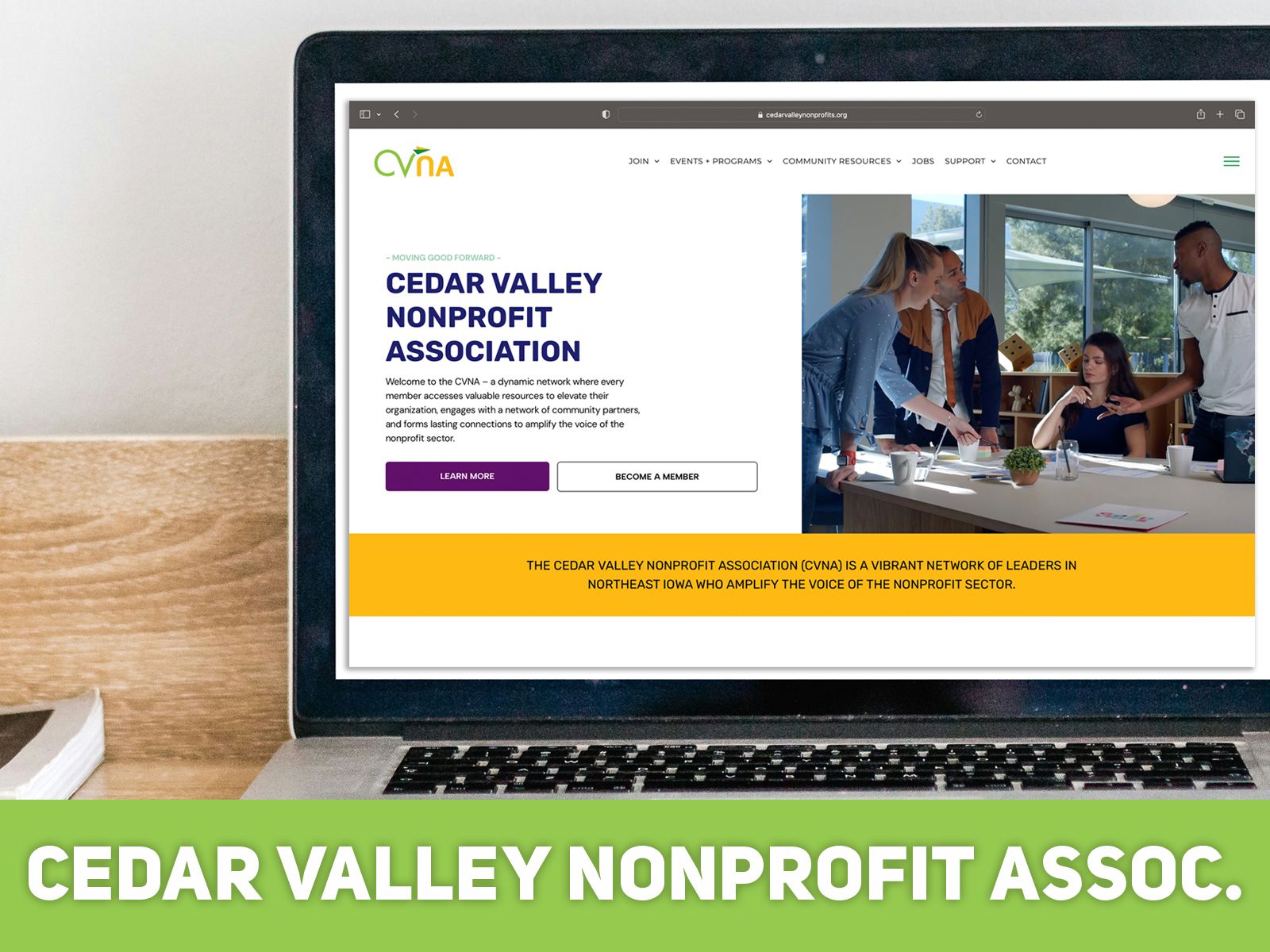 A laptop is open to the cedar valley nonprofit association website