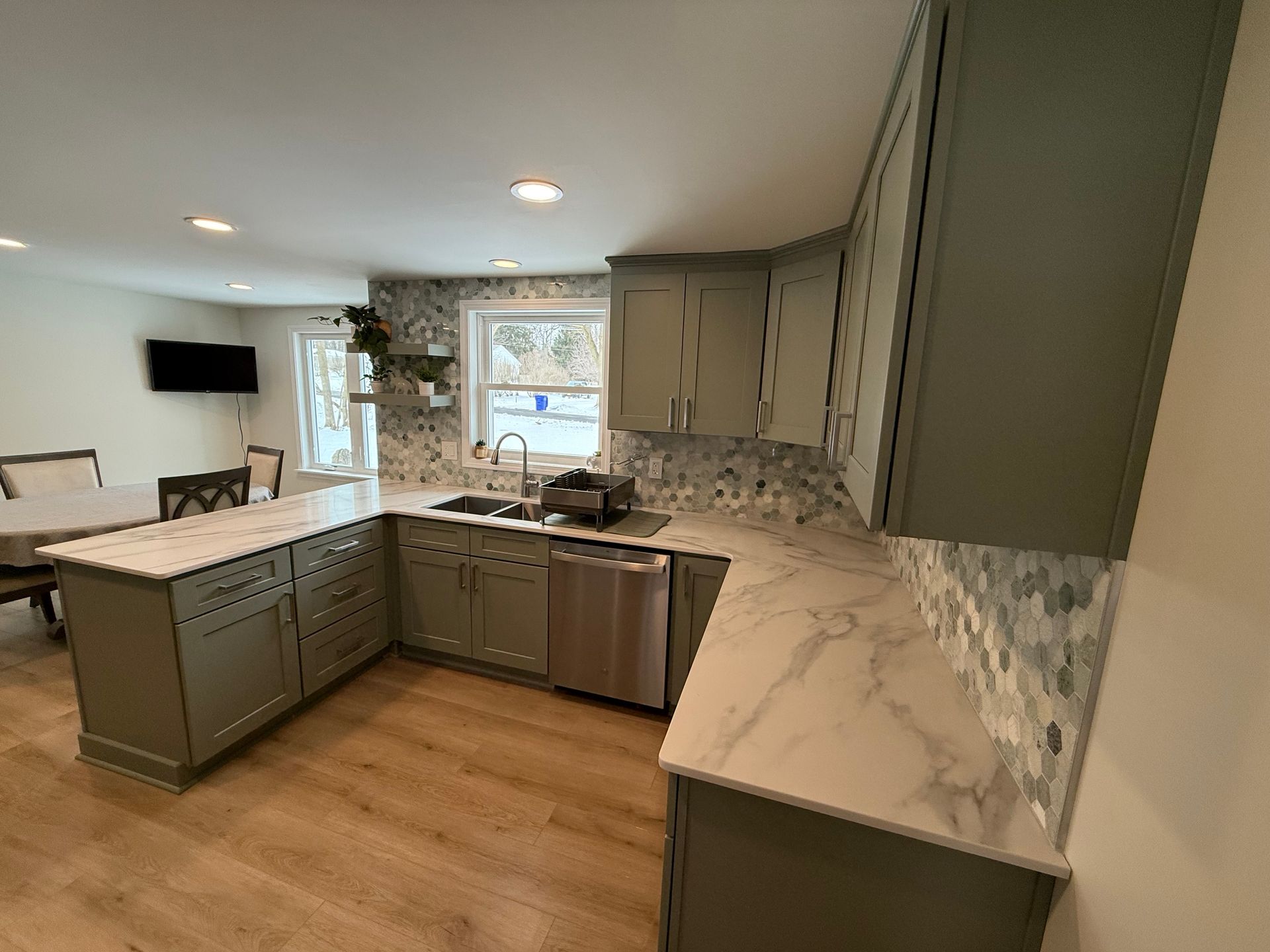 A kitchen with wooden cabinets and a white refrigerator