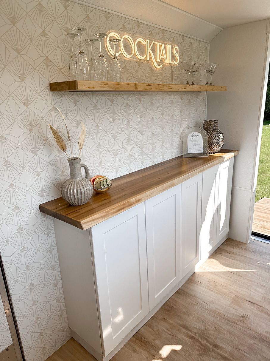 Inside wallpaper of The Cocktail Cart and shelf