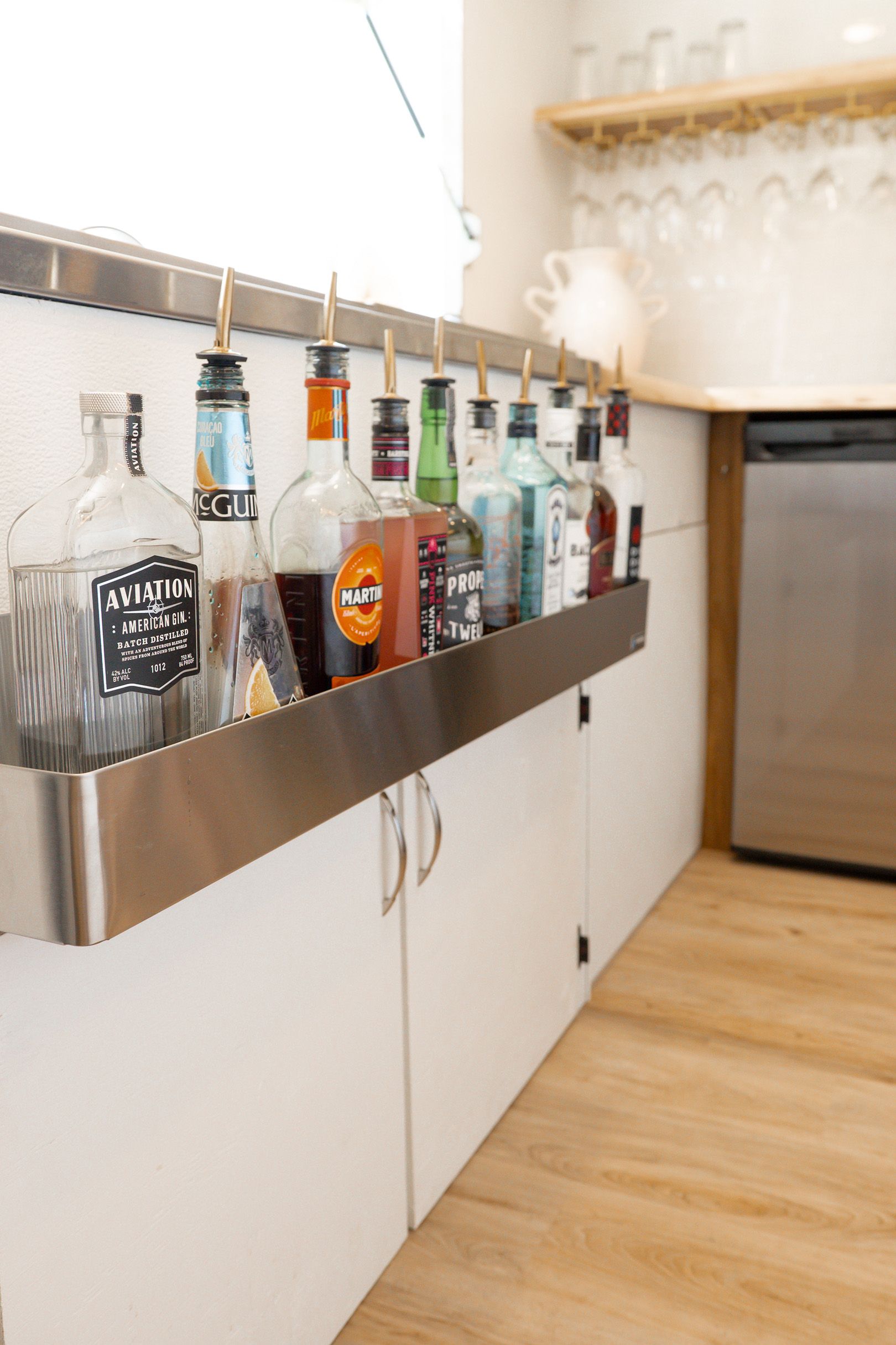 Lineup of spirits in The Cocktail Cart