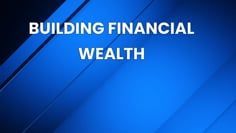 A blue background with the words `` building financial wealth '' written on it.