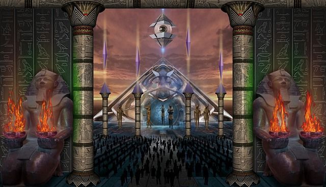 A group of people are standing in front of a pyramid in a temple.