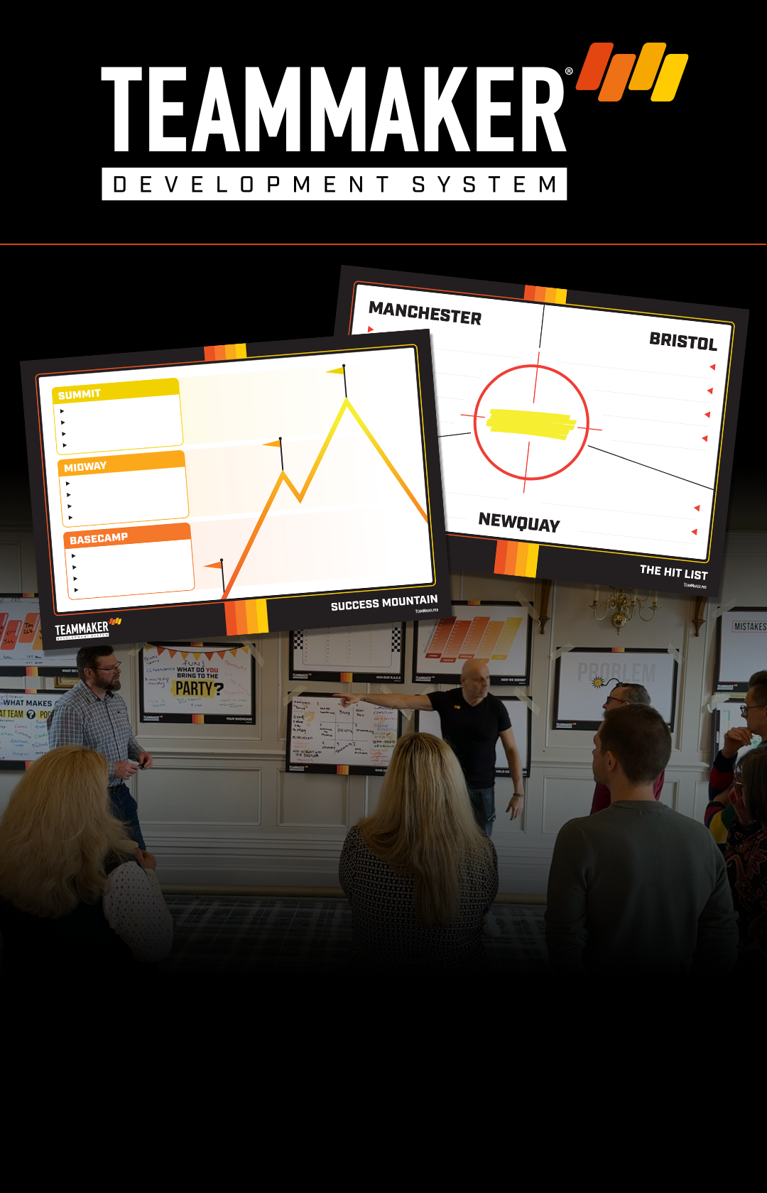 A group of people are standing in front of a wall with a lot of screens.