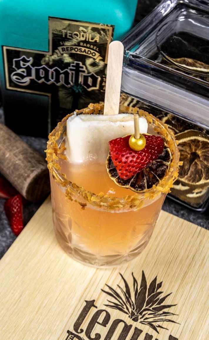 Tequila Daisy cocktail with frozen popsicle