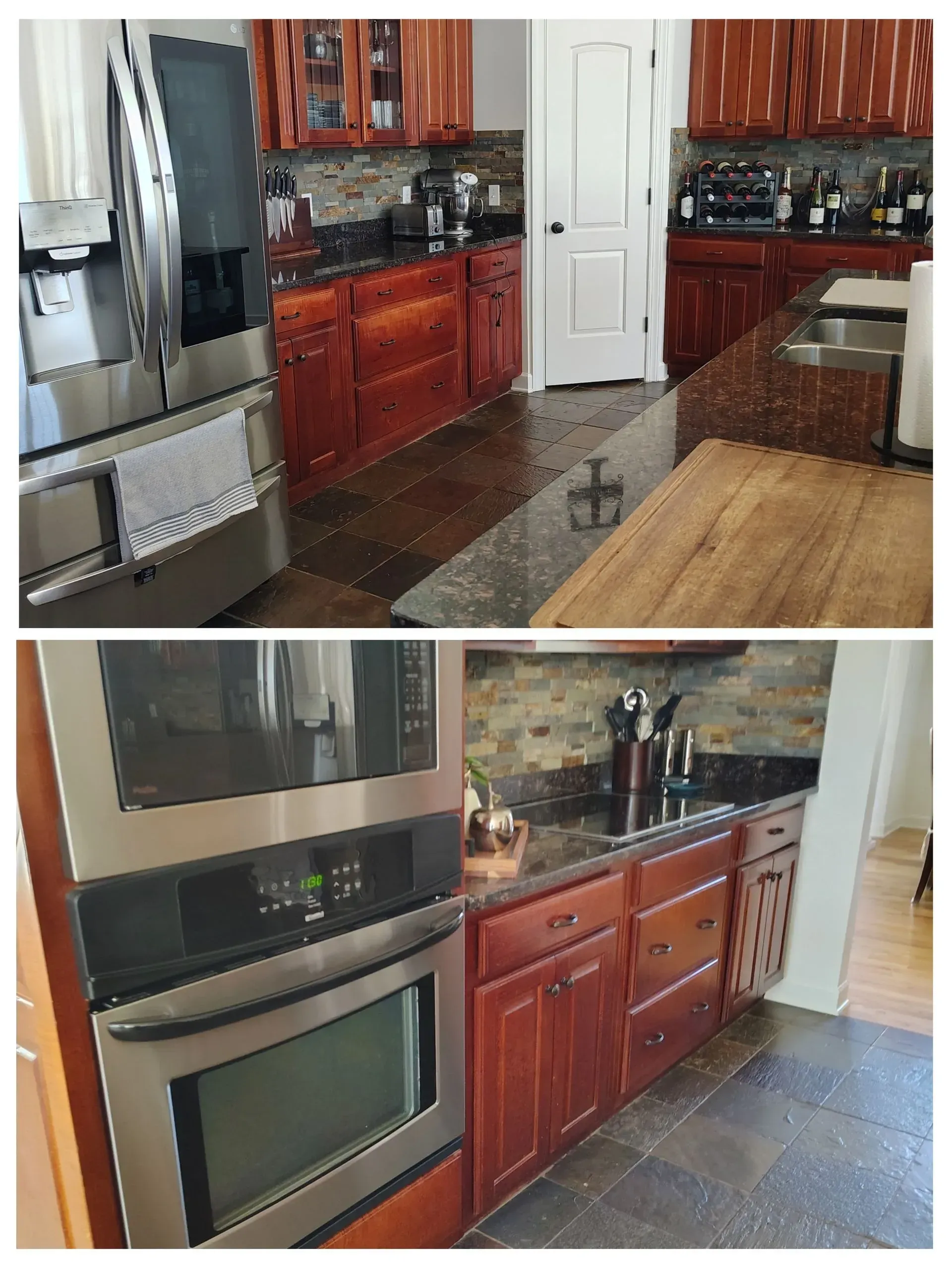 Kitchen with cherry cabinets, black appliances, granite countertops, and a central island.