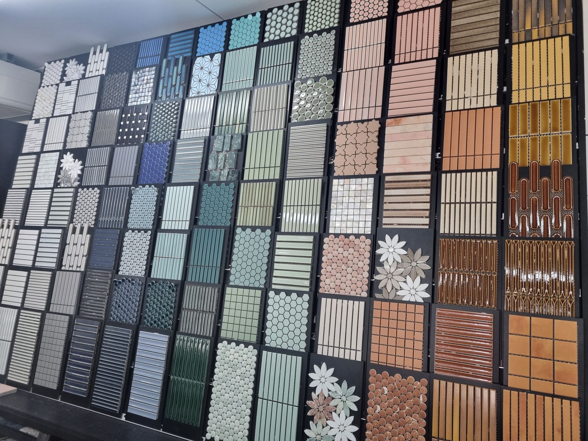 Mosaic Tiles Displayed on the Wall — Tile Supplies in Alstonville in Alstonville, NSW Mosaic Tiles Displayed on the Wall — Tile Supplies in Alstonville in Alstonville, NSW