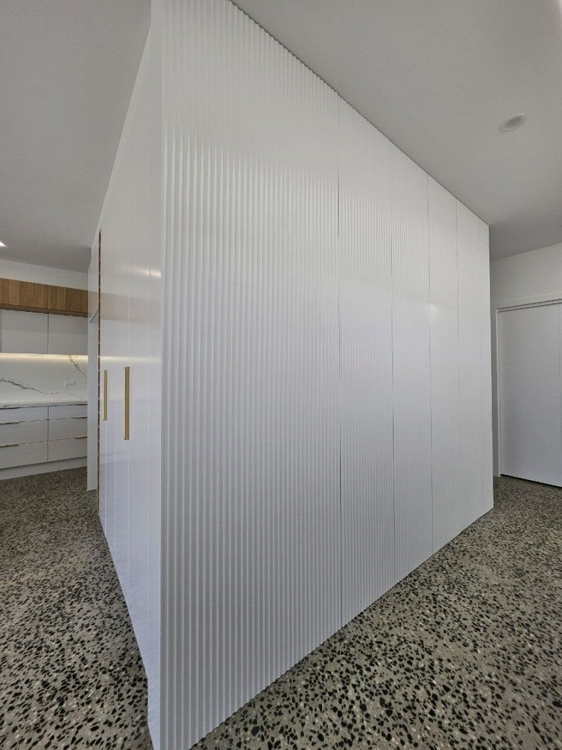 White Translucent Partition Wall in a Modern Interior Hallway — JDS Kitchens & Detailed Joinery in Albion Park Rail, NSW