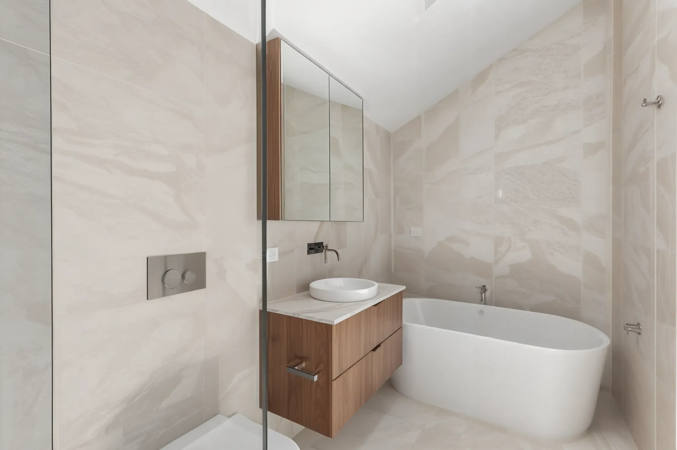 Modern Bathroom with Wood Vanity, Wall Mirror, Glass Shower, and White Freestanding Tub — JDS Kitchens & Detailed Joinery in Albion Park Rail, NSW