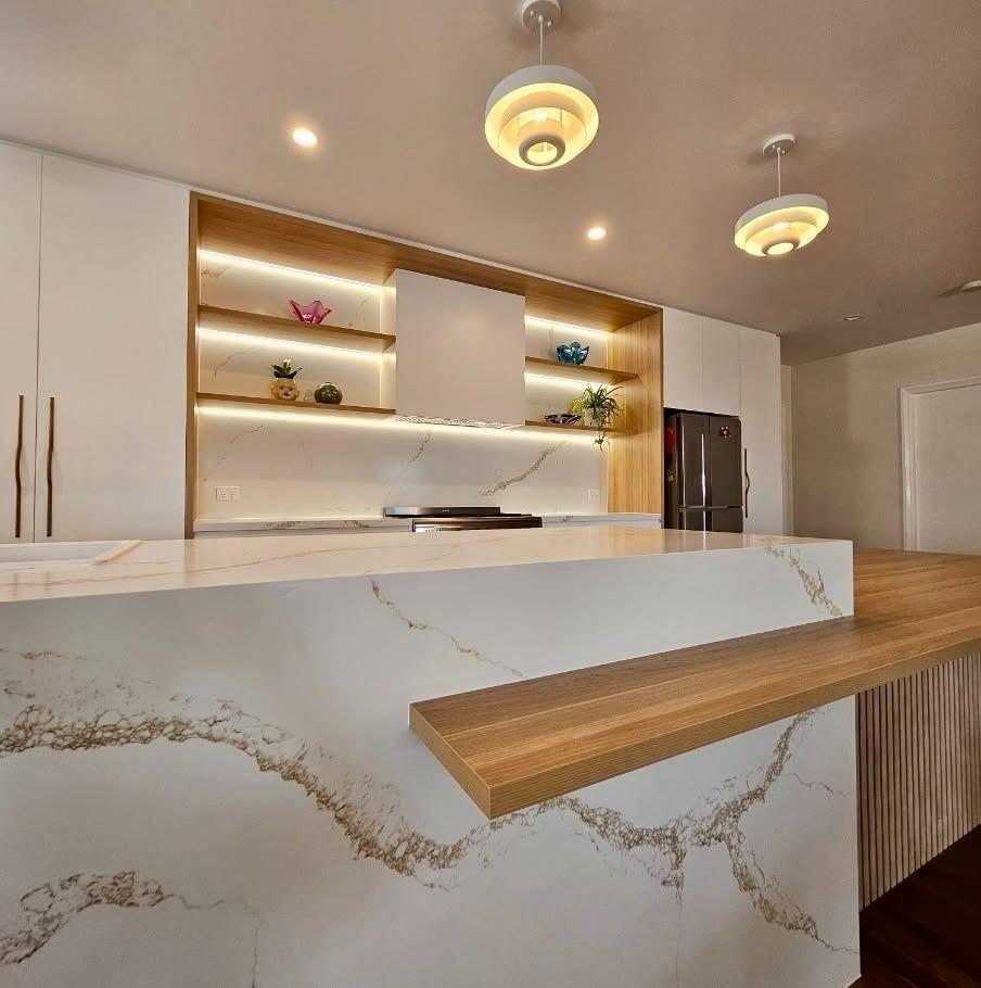 Modern Kitchen with Marble Island, Wood Accents, Open Shelving, and Pendant Lights — JDS Kitchens & Detailed Joinery in Albion Park Rail, NSW