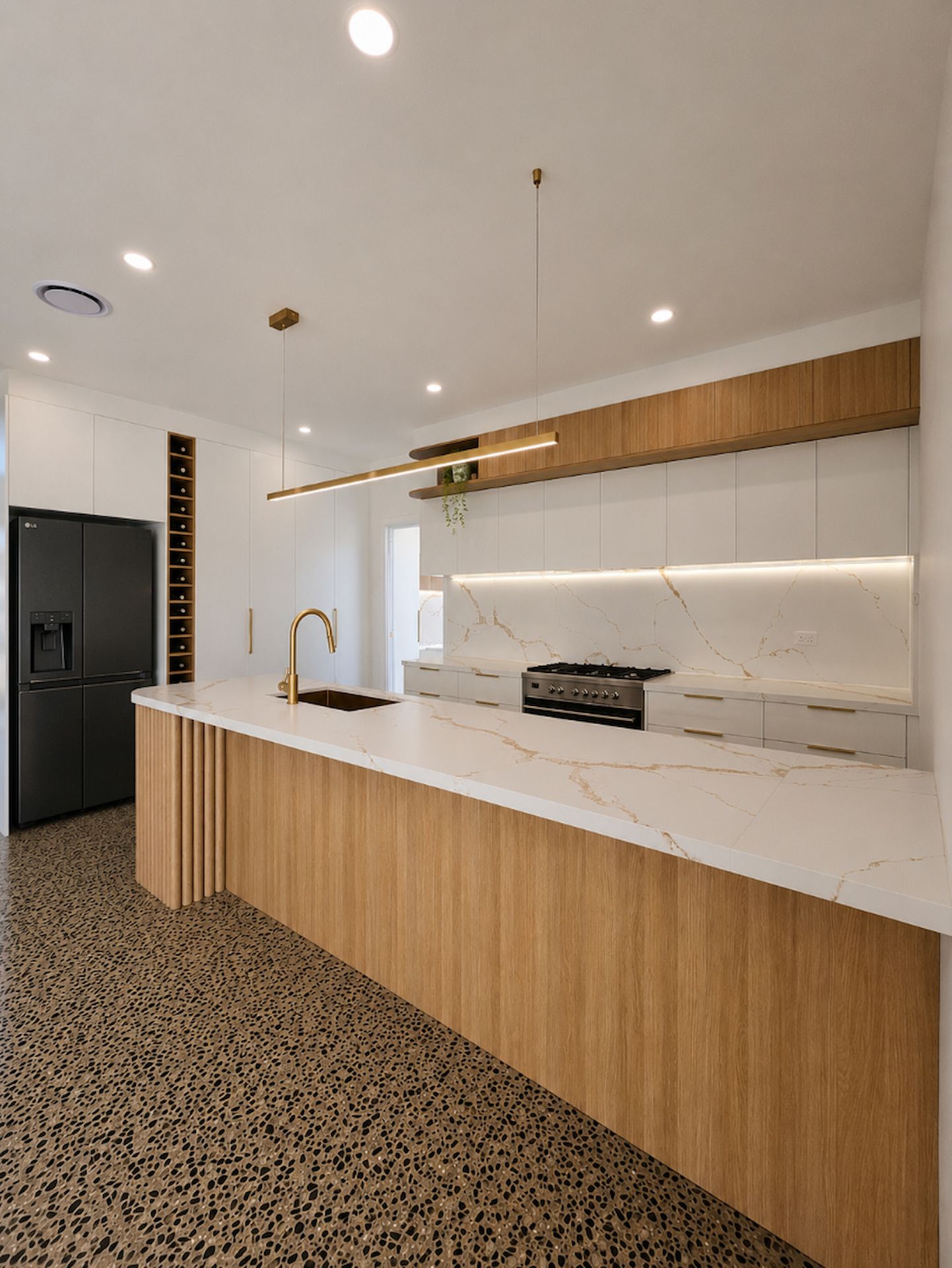 Modern White Kitchen with Wood Cabinets — JDS Kitchens & Detailed Joinery in Albion Park Rail, NSW